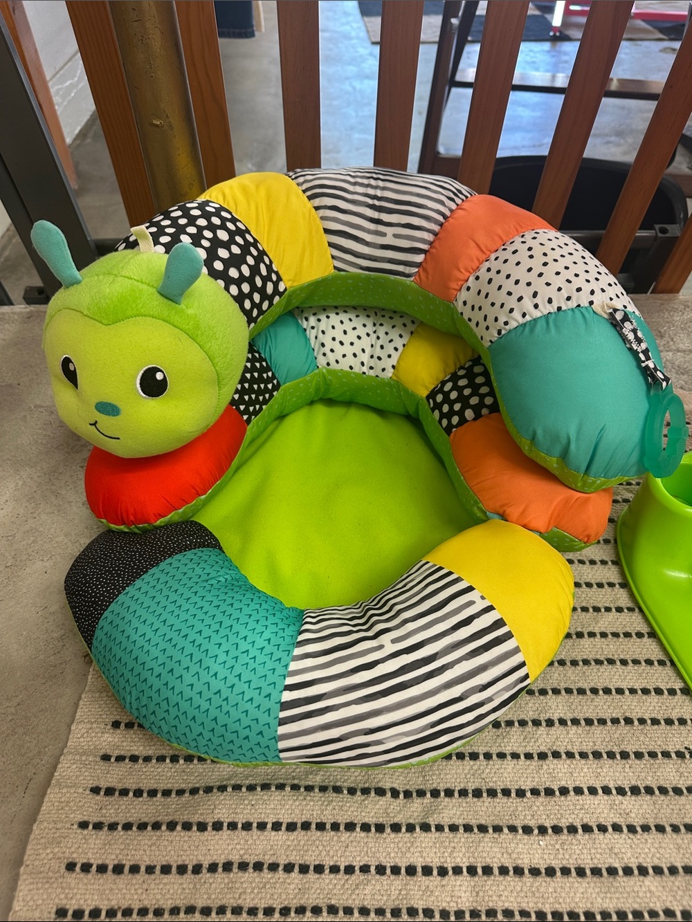 Infantino Green Patchwork Caterpillar Activity Seat with Multi-Color Panels
